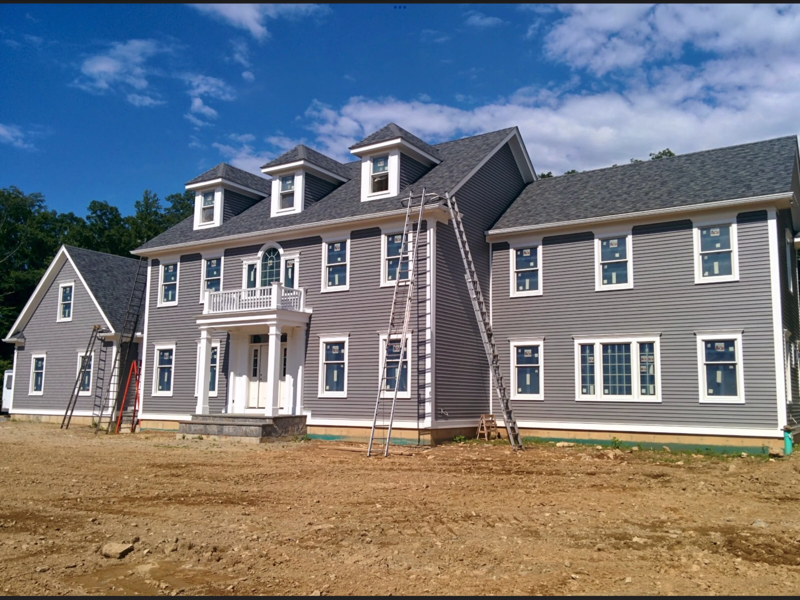 roofing and siding contractor ct gray 3 story house